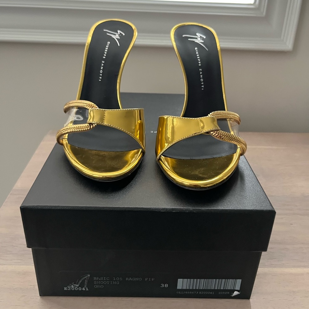 Beautiful brand and brand new slip on heels size 38